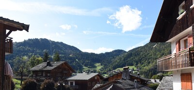 350m from the ski lifts, parking, in the village of La Clusaz