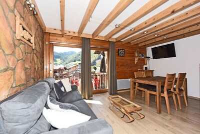 350m from the ski lifts, parking, in the village of La Clusaz