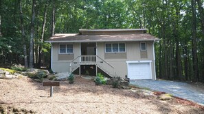 FRONT OF HOUSE  WITH PARTIAL VIEW OF CIRCULAR DRIVEWAY