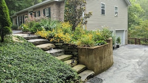 Park in driveway to the right of the home.