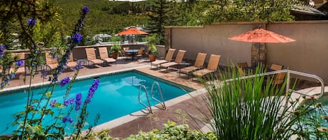 Dive into the gorgeous outdoor heated pool.