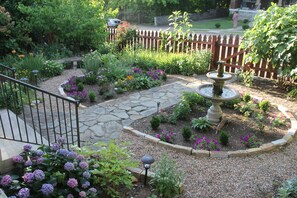This gorgeous English Garden welcomes you into Selah House.