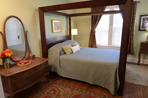 Bedroom "D"  is a spacious bedroom with queen bed, dresser and kids play nook.