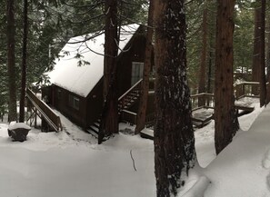 Mountain House cabin after a bit of snow