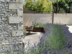 The south facing terrace , a place to cook and eat