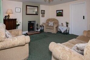 Spacious lounge with log burner, TV, Wifi and Netflix.  