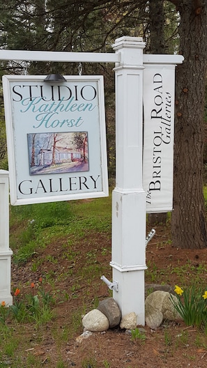 Kathleen Horst Studio Gallery sign beside driveway turn in