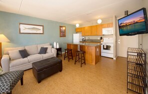 Granite counters in kitchen and queen sleeper sofa in living room