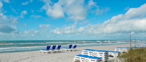 We have new comfortable beach chairs on our beach, umbrella is in the unit