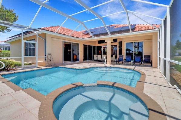 The pool & hot tub have been newly surfaced. Lounge pool side in the southern facing lanai.