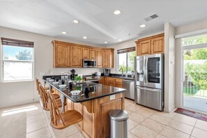 Kitchen with all-new appliances (@2022) including an Air Fryer.