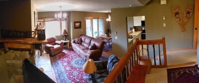 Living room, looking into kitchen and dining room