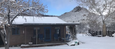 House in winter snow storm. 