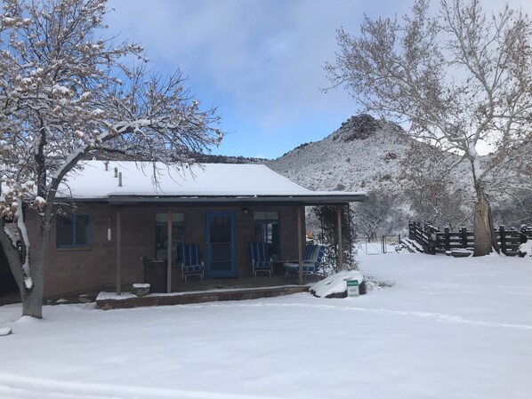 House in winter snow storm. 