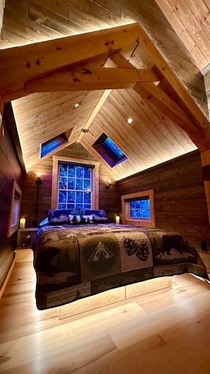 Your Treehouse bedroom!  Trees are just INCHES from every window!  It’s unreal✨ 