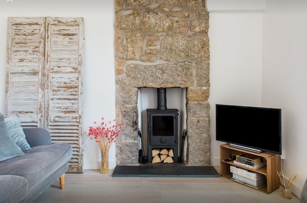 The woodburner and all home comforts are perfect for a cosy night in
