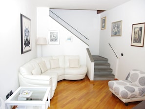 Furniture, Room, Property, Living Room, Stairs, Floor, Interior Design, Couch, Sofa Bed, Building