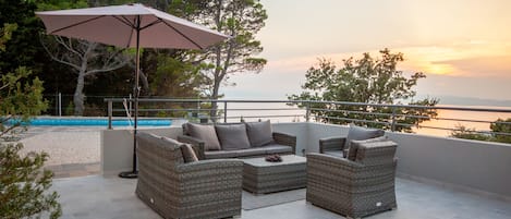 Sunset from the terrasse with view to the sea.