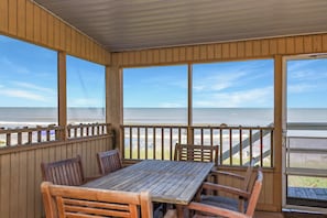 Dining on Beach Front Screened Deck