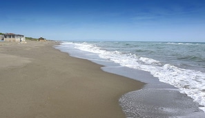 The beach is 4 km from the villa and has a nice café