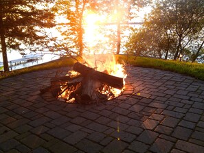 Large fire pit with swing. We supply the wood!