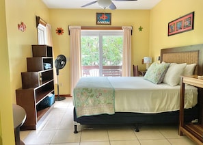Large studio with kitchenette and Queen bed.