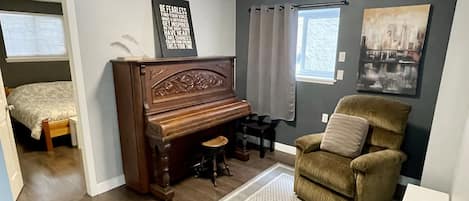 sitting area with piano