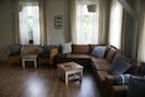 The large sitting room with DVDs, CDs, toys, books & tourist information