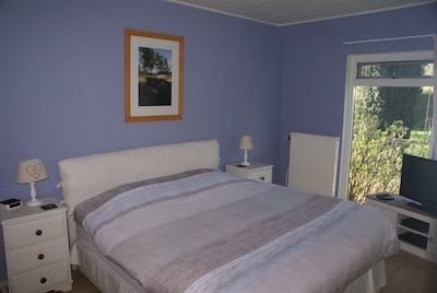 Downstairs double bedroom with built-in wardrobe, LCD tv with Blu-ray player
