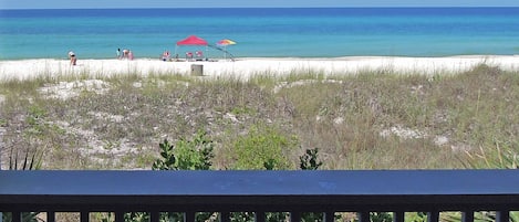 1st Floor directly on the Beach! Step off our deck onto the beach sand!