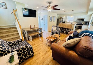 Open concept living, dining & kitchen areas, perfect for enjoying time together!