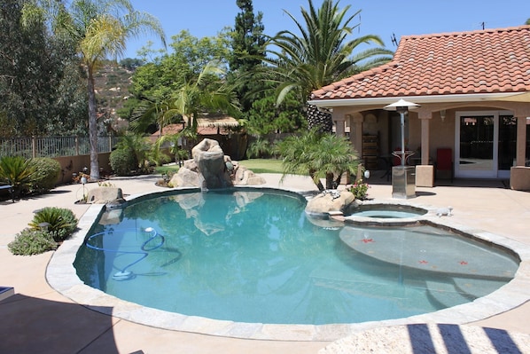 Pool with jump rock. 9 feet at deep end