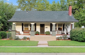 Step back in time as you relax on the front porch of this historic home. 
