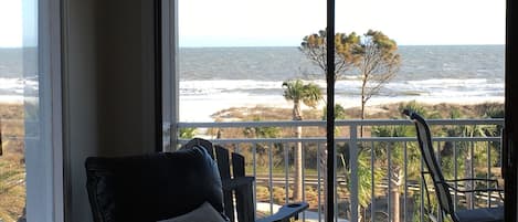 True 270 degree direct ocean front view from kitchen. 55” Samsung QLED Smart TV