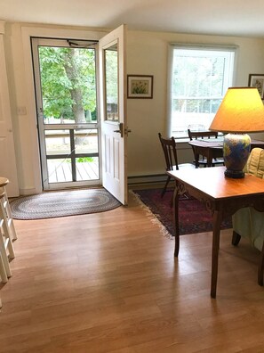 Entry door with keyless lock system opens into living areas from the front deck.