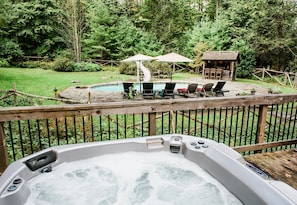 Looking at pool from hot tub on deck