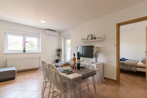 Specious living room with dining area and kitchen