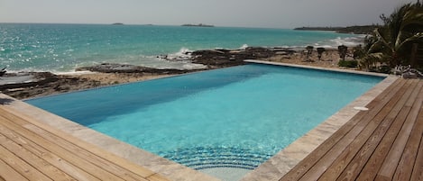 Salt-water infinity pool on back deck