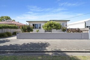 Front fence and street access. Flat off street parking including carport. 