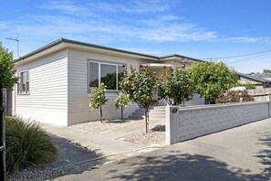 Front yard and driveway opening. 
