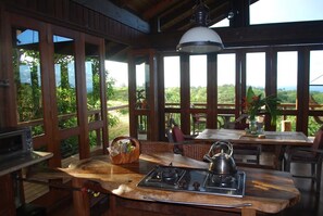 Monkeypod Wood Island and Dining Area Overlooking Ocean 