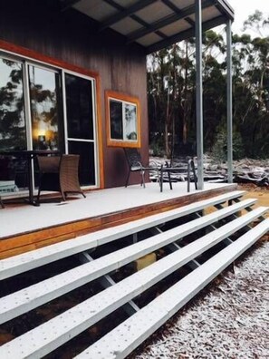 Sprinkle of winter snow on deck 