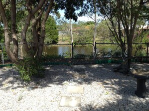Rear yard with lake in view