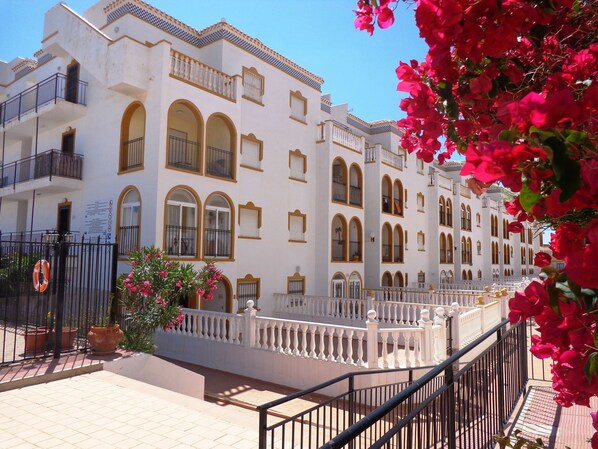 Molino Blanco II south facing apartment entrance  with elevator/stairs,2nd floor