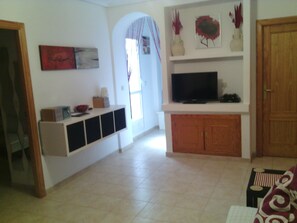 Modern sunny lounge, large flatscreen tv,dvd,sat,ikea sofabed,table and chairs.