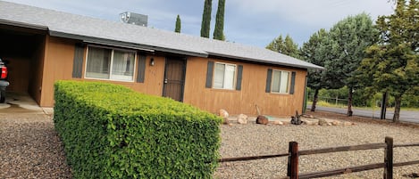 Front of house 
With yard and car port