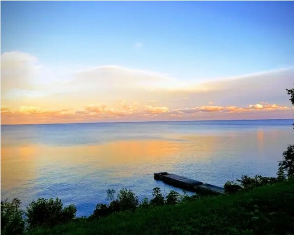 Beautiful sunrise view from our lakeview property! These colors!!!