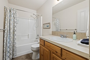 This second bathroom is shared with bedroom #2 and #3 and has a tub/shower combo!