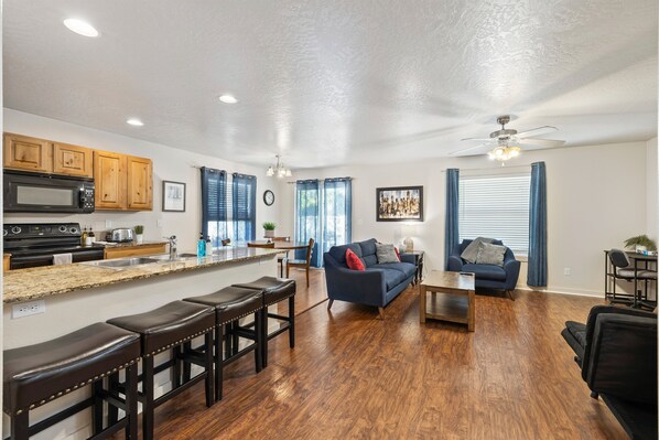 Everyone will be part of The action in this home's comfortable open concept.