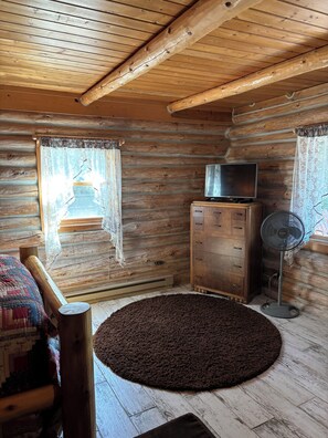 Main floor master bedroom, no cable, but bring movies (CD).